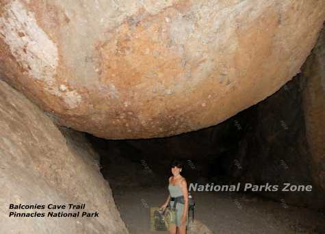 Picture of a huge boulder wedged in a crevice in Pinnacles National Park's Balconies Cave hike