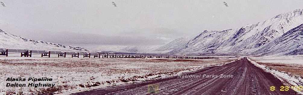 Picture of Dalton Highway approaching the Atigun Pass.  Alaska pipeline is on the left